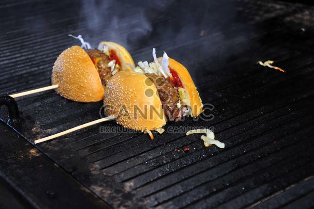 Fried burgers on grill - Free image #182881