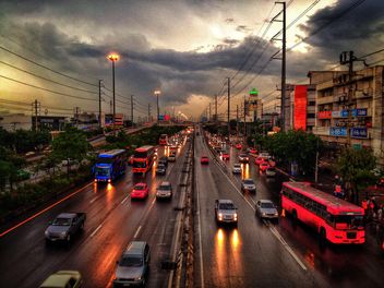 city at sunset, cars on road - image #205081 gratis