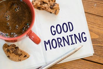 Cup of coffee, cookie and notes on wooden background - бесплатный image #271591