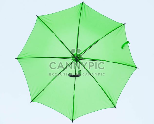 Green umbrella hanging - image #273061 gratis