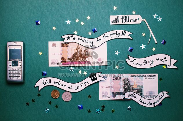 Mobile phone, paper label banners and money - image #327331 gratis
