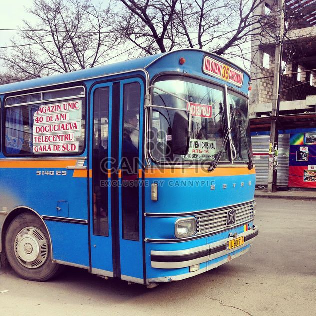Blue bus on the street - image #332091 gratis