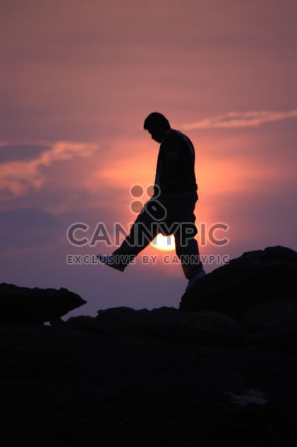 Silhouette of man at sunset - image gratuit #338531 