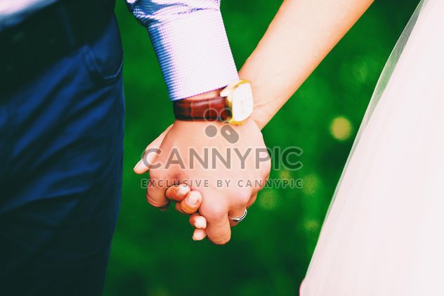 Wedding couple holding hands closeup - image gratuit #345101 
