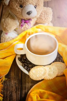Cup of coffee with crackers, coffee beans and teddy bear - бесплатный image #452491