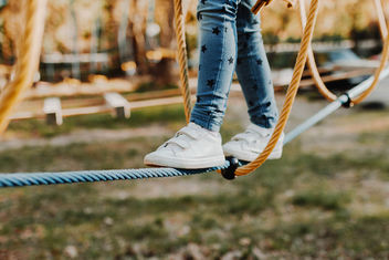Young girl walking on rope in rope park. Legs detail - Free image #453721