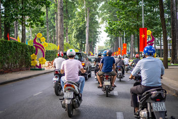 Vietnamese Flags and Tet Decorations along a Street in Saigon, Vietnam.jpg - Free image #458761