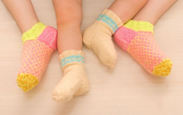 Children in warm socks, two sisters - image #182641 gratis