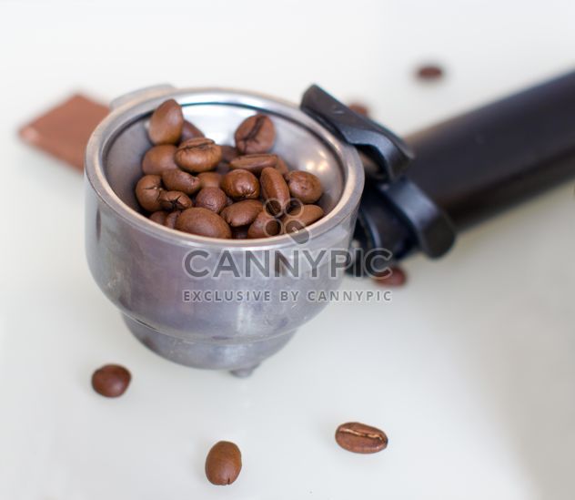 Coffee beans in portafilter - Free image #182671