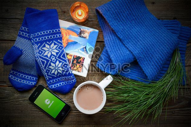 Book, coffee, warm woolen clothes and candle on the wooden table - Free image #182791