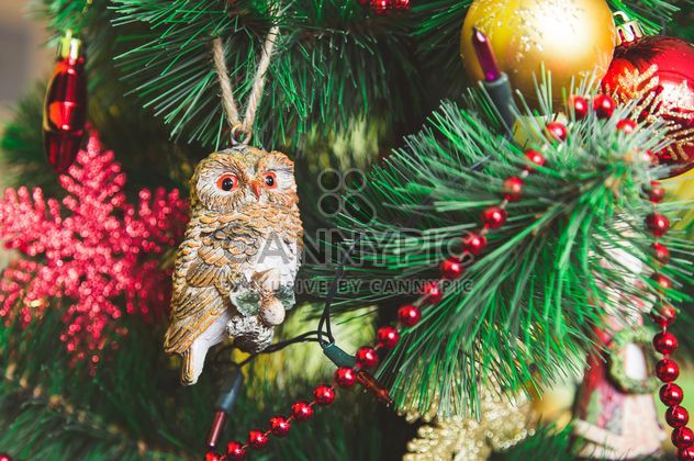 Cute Christmas toy on a branch - Free image #182941