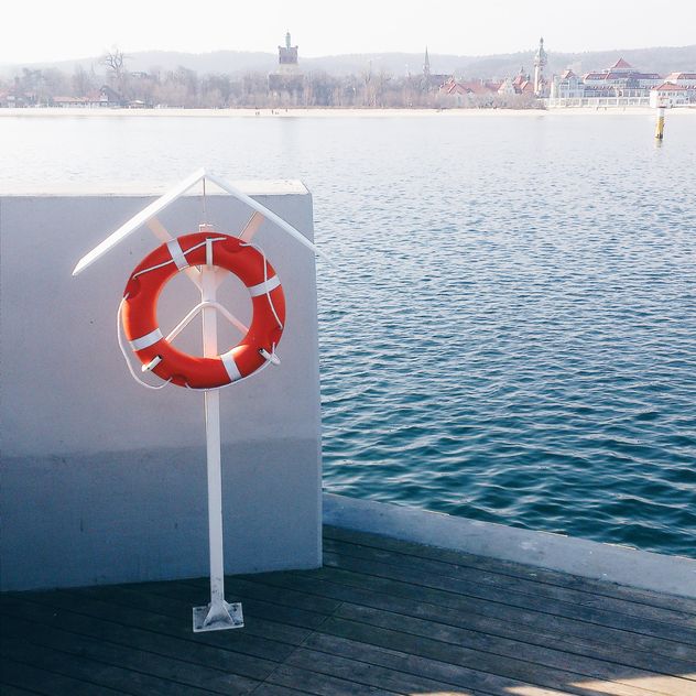 Lifebuoy on pier - Free image #184631