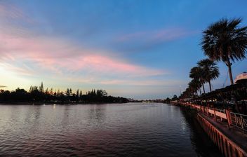 Sunset on river enbankment - Free image #186511