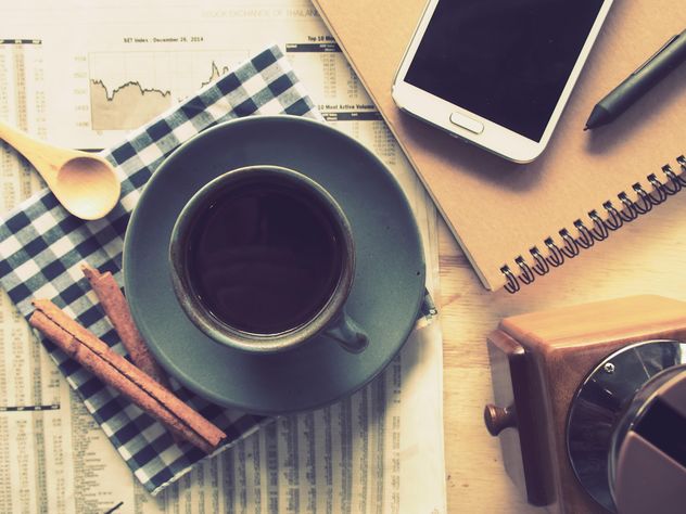 Cup of black coffee, smartphone and notebook on the table, vintage effect - Free image #187081