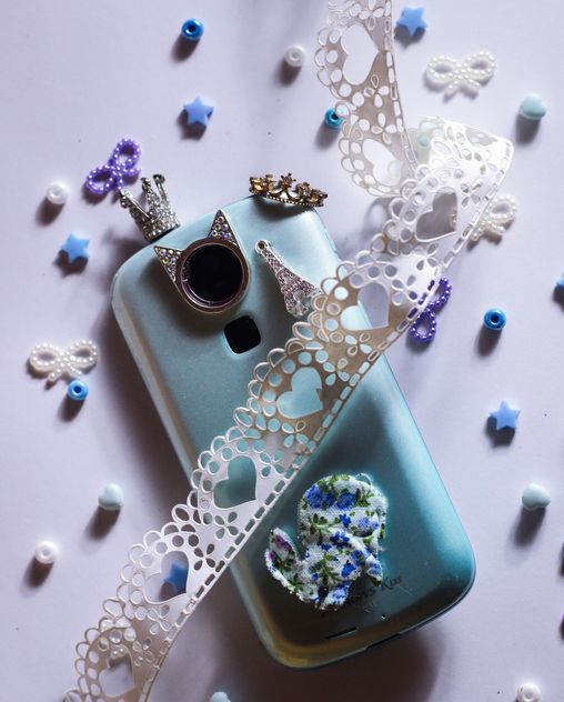 blue smartphone with little crown - бесплатный image #187251
