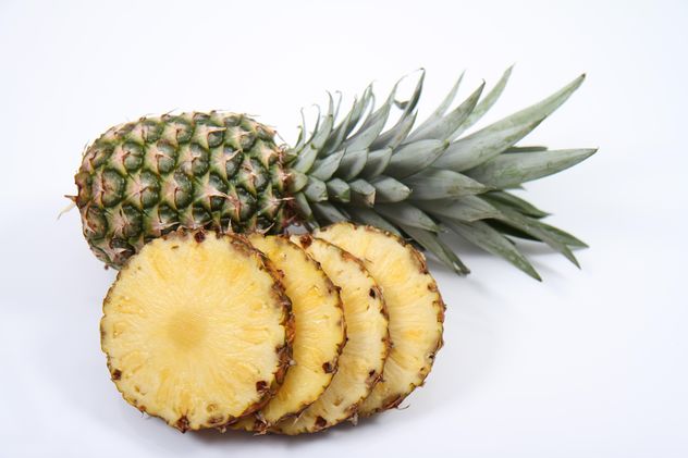 Whole and sliced pineapples on white background - image gratuit #187801 