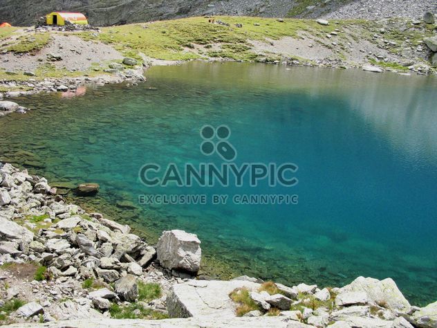 Glacier lake with turquoise water in Carpathians mountains - image #198131 gratis