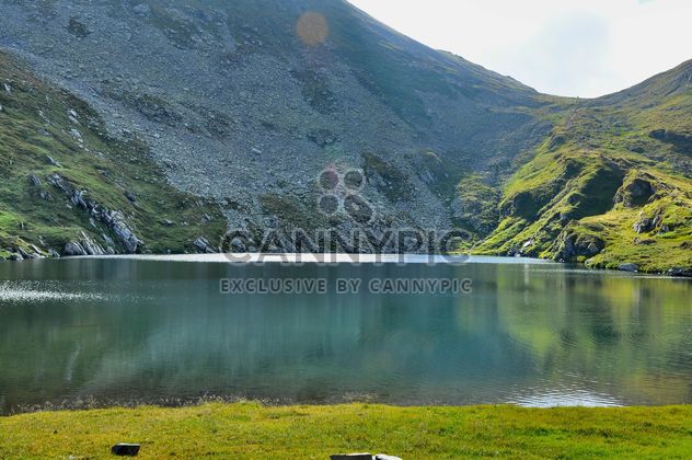 Glacier lake in Carpathians mountains - image #198141 gratis