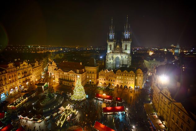 square with Christmas tree at night in czech republic,Twin towers of Tyn cathedral in Prague, - бесплатный image #198641