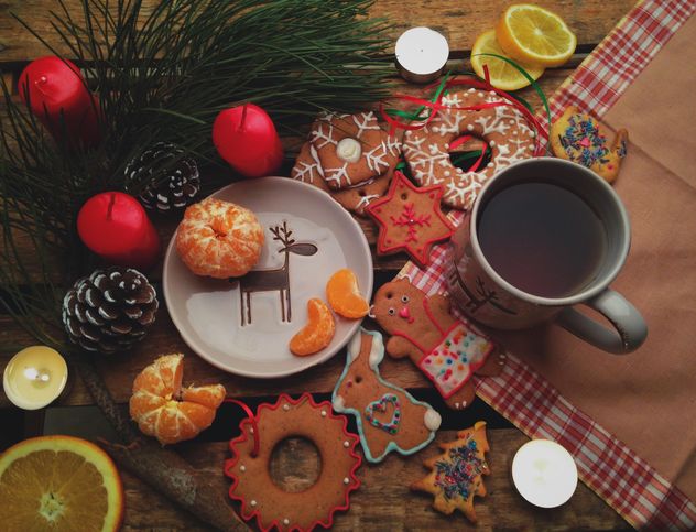 Christmas cookies and tangerines - image #198841 gratis