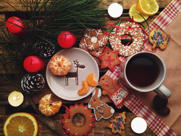 composition with Christmas cookies candles and tangerines - image #198851 gratis