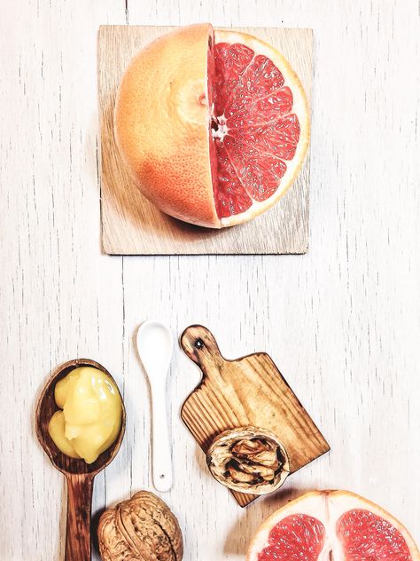 Grapefruit, walnuts and cutting board - Free image #199001