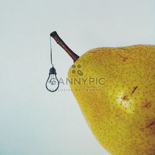 Pear and painted light bulb isolated on white background - Free image #272191
