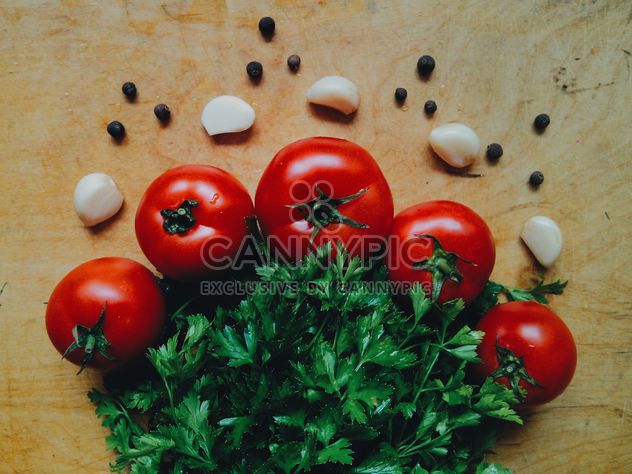 Tomatoes with garlic - image #274851 gratis
