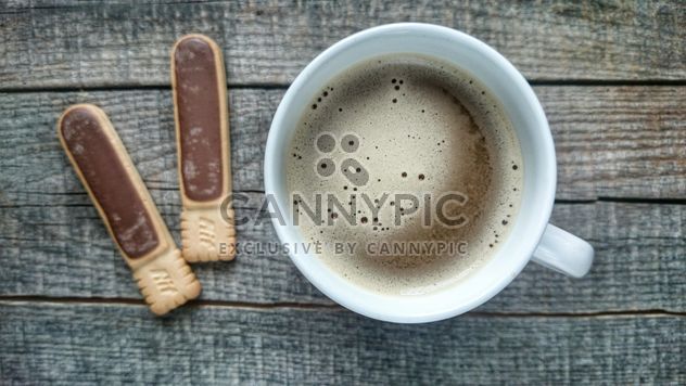 Coffee on wooden table - image #302291 gratis