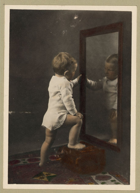 I sure am good looking in my pajamas ... Vintage Picture of a Cute Young Boy Looking at His Reflection in the Mirror - Free image #314151