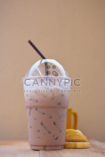 Iced coffee in plastic glass - image #330431 gratis