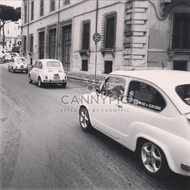 Old Fiat cars on road - image #331841 gratis