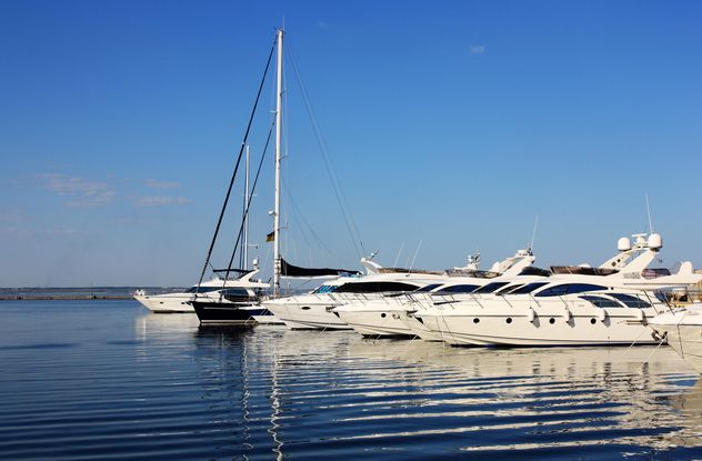 white yachts on a blue sea - image #333261 gratis