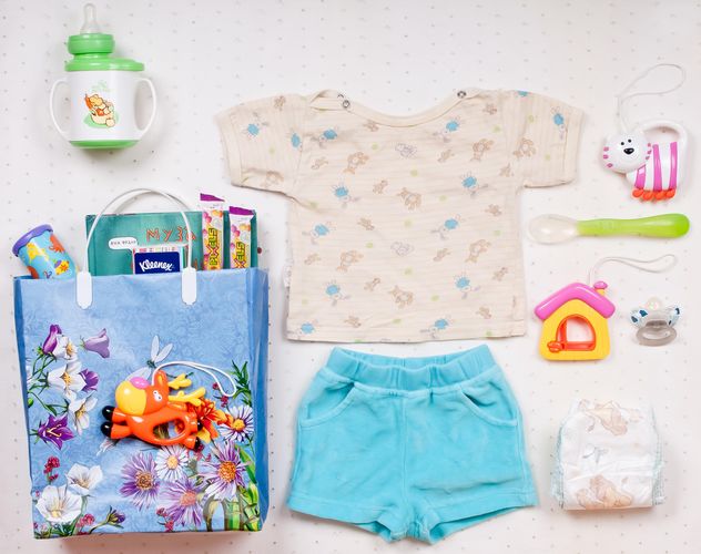 Baby's clothes and things on white background - Free image #342901
