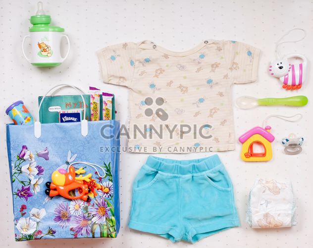 Baby's clothes and things on white background - Free image #342901