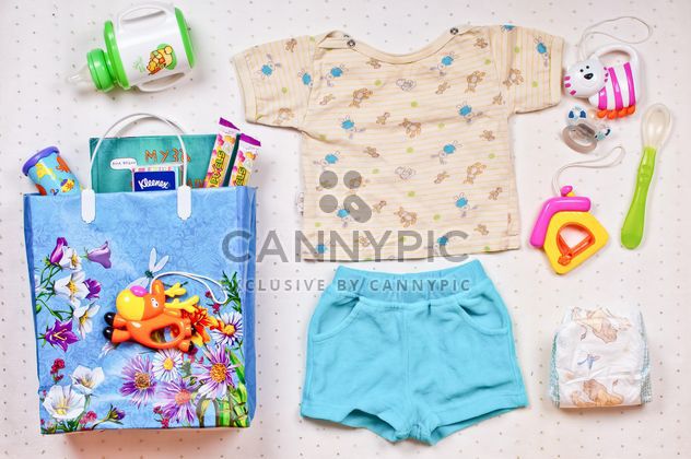 Baby's clothes and things on white background - Free image #343591