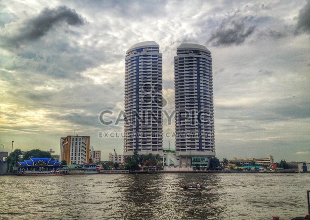 Twin buildings on riverside of Chao Phaya River, Bangkok, Thailand - Free image #346221