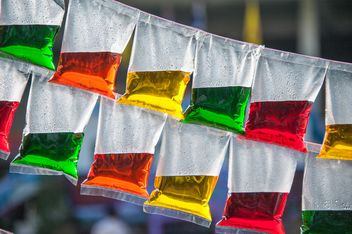 Colored water in plastic bags - image #347231 gratis