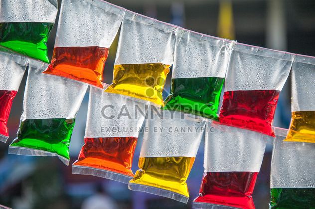 Colored water in plastic bags - Free image #347231
