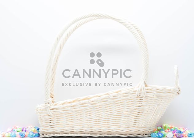White wicker basket on white background - бесплатный image #347241