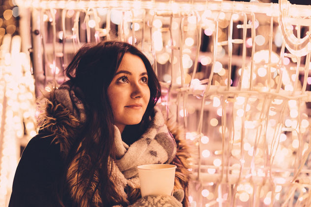 Christmas lights and girl holding coffee - бесплатный image #409681