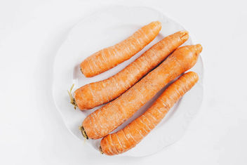 Top view of group of carrots on white background.jpg - Free image #452771