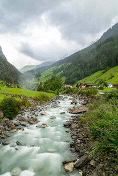 Mountain river flow in Swiss mountains disappearing in clouds - Free image #475161